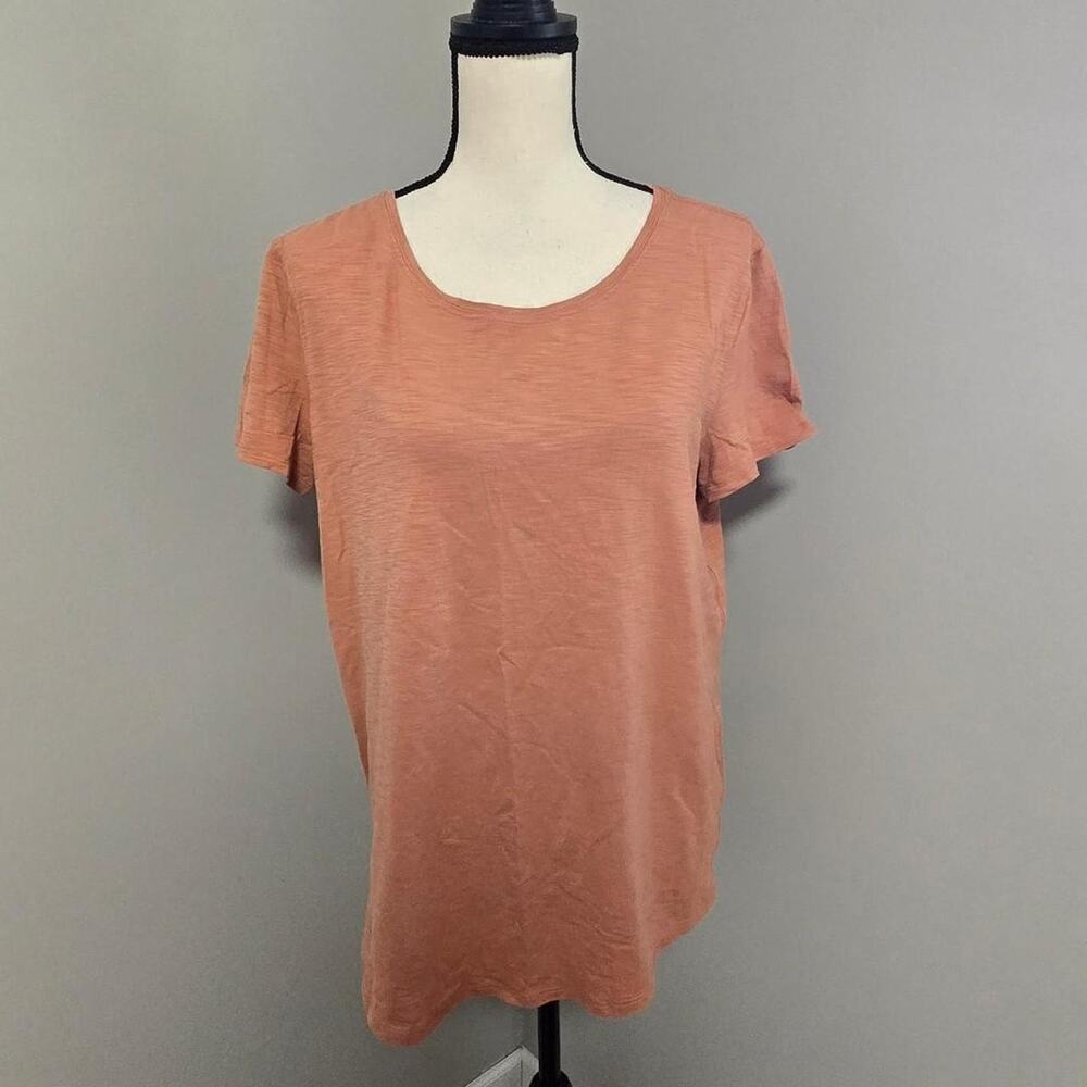 lululemon womens peach pink tee shirt. no tag. fits like a large or 12. nwot